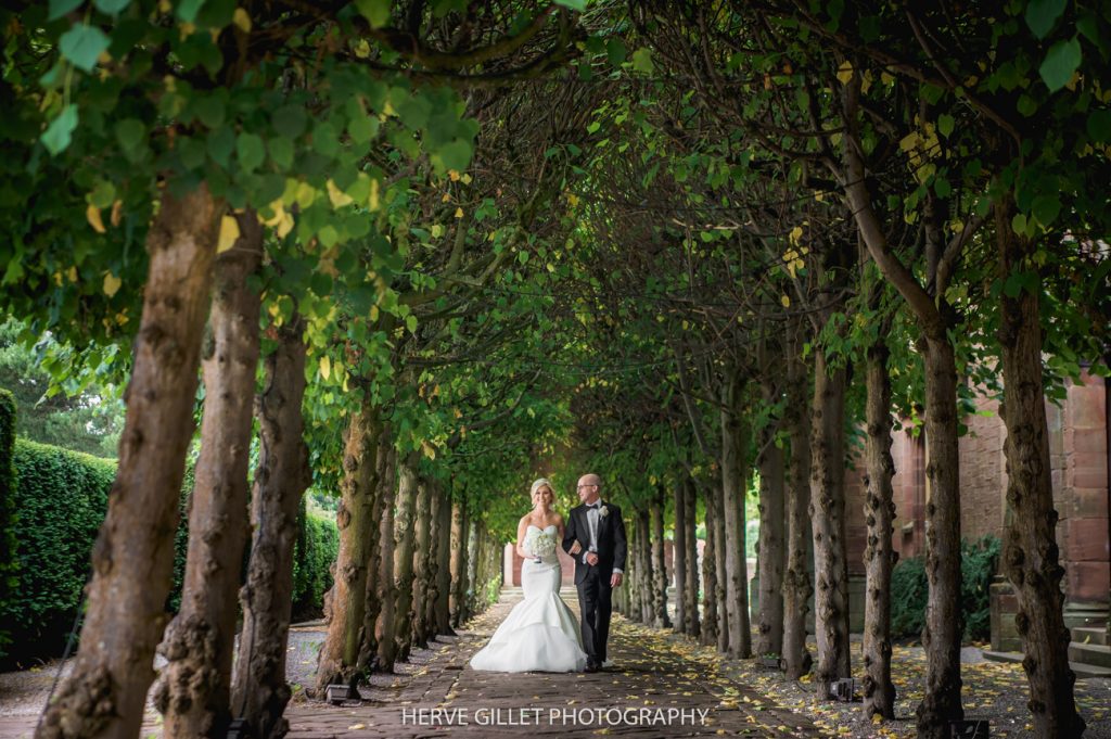 father of the bride walking at Thornton Manor wedding photography